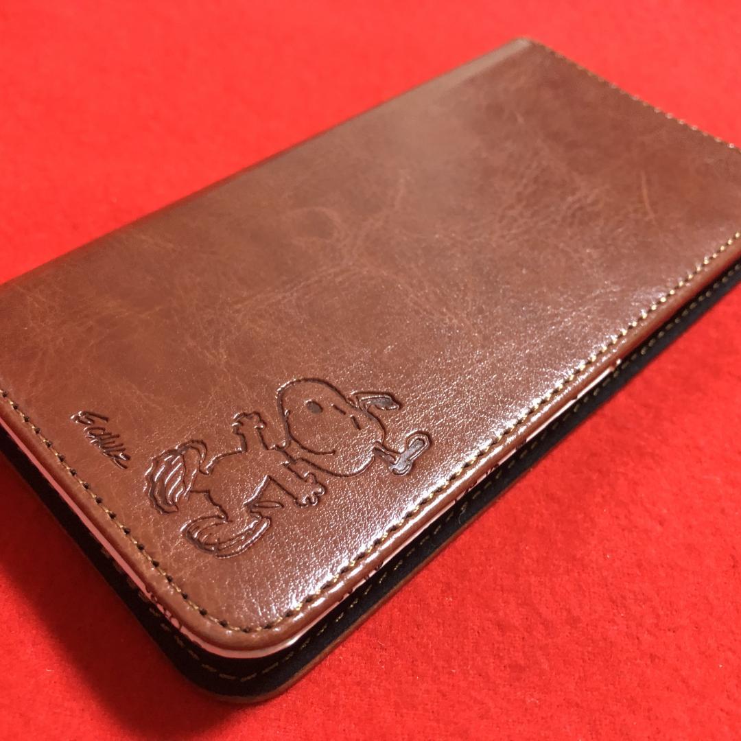 スヌーピーフリップカバーiPhoneX対応：手帳型・マグネットロック・ポケット付