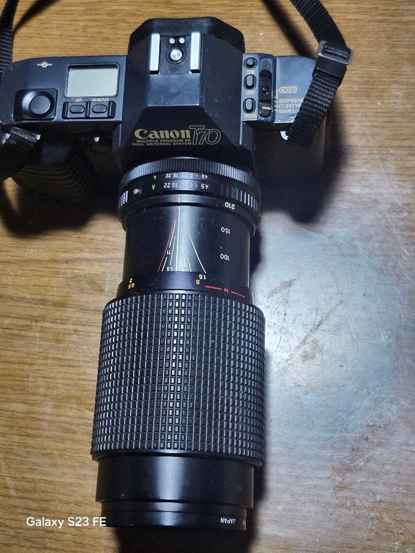 Canon T70 一眼レフフィルムカメラとSunpakフラッシュ望遠レンズ2